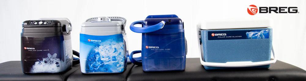 Four Breg cold therapy machines in different models and colors displayed in a row on a black surface with Breg logo