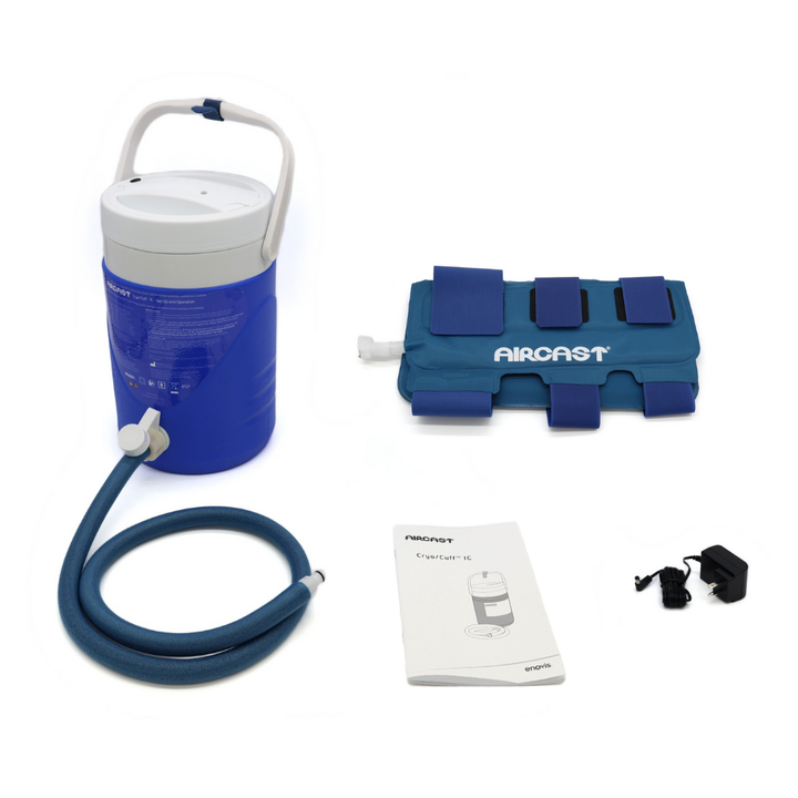 Aircast Cryo Cuff IC cold therapy device with hand and wrist pad, hose, power adapter, and manual